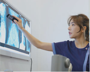 Hybrid Method combining hands-on therapy with advanced medical technology